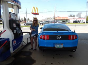 Shannon with her favorite Mustang  She is a Mechanical Engineer also