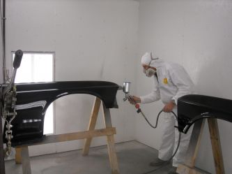 Paul painting fenders.