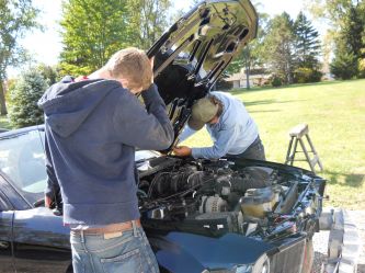 Sean and Paul install the hood